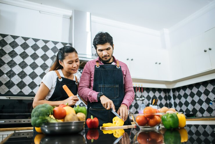 Couple cooking together
